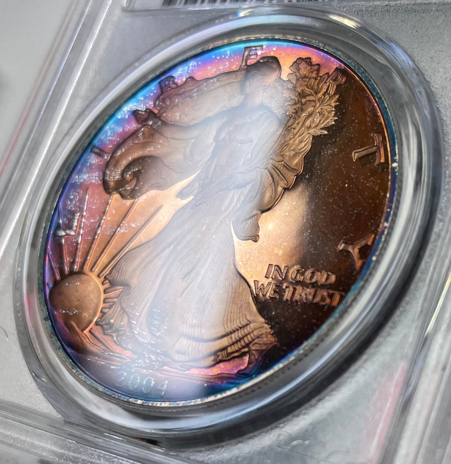2004 Silver Eagle Proof - PCGS PF66 DCAM - Deep Rainbow Toned - CoinsTV