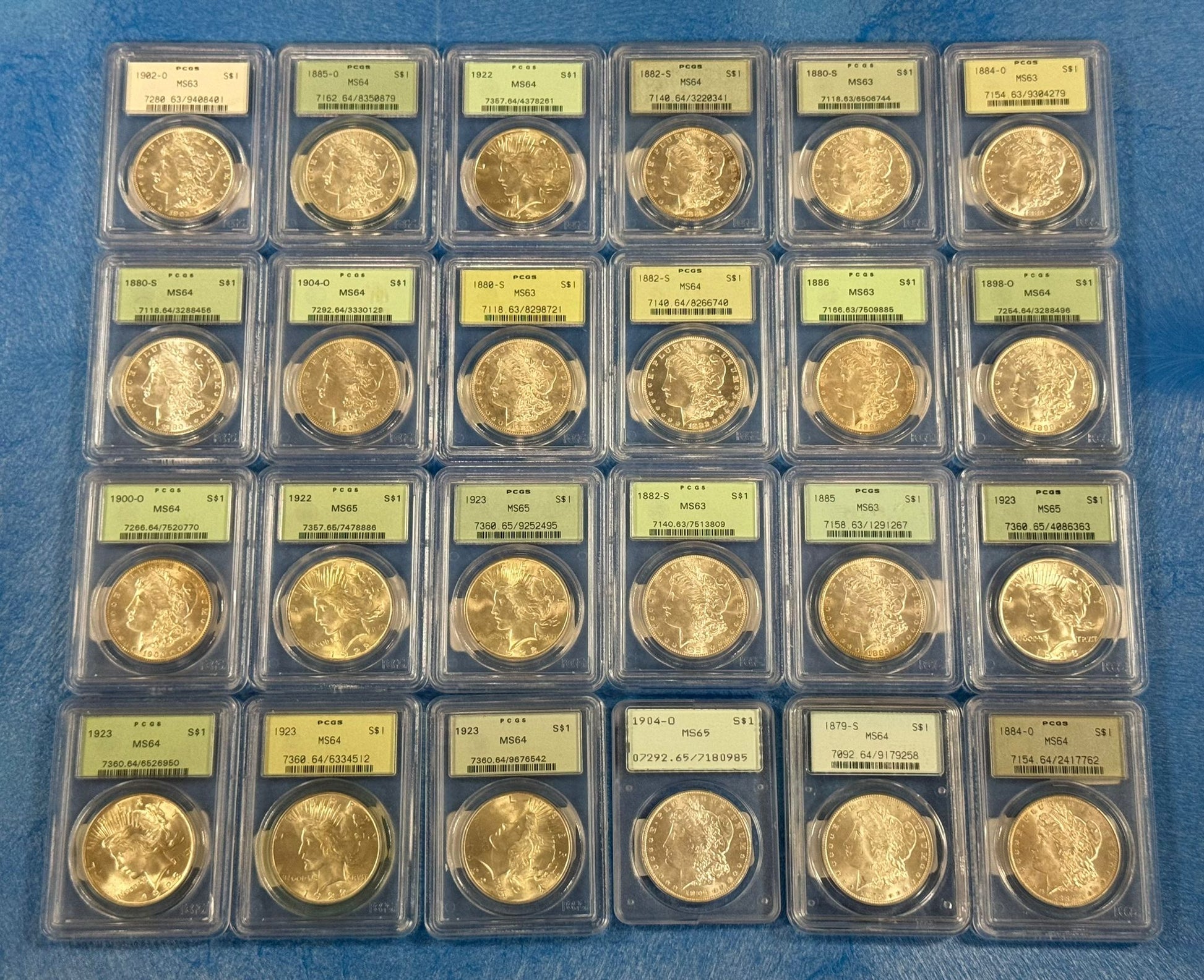 Morgan and Peace Dollar OGH Mixed Grade Grab Bag - CoinsTV